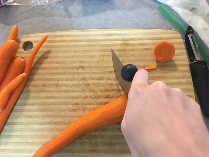 Me chopping a carrot 