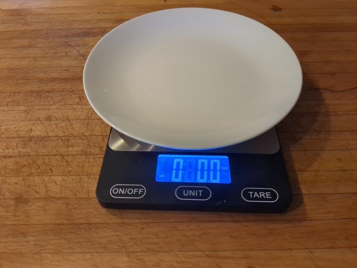 Taring the scale.