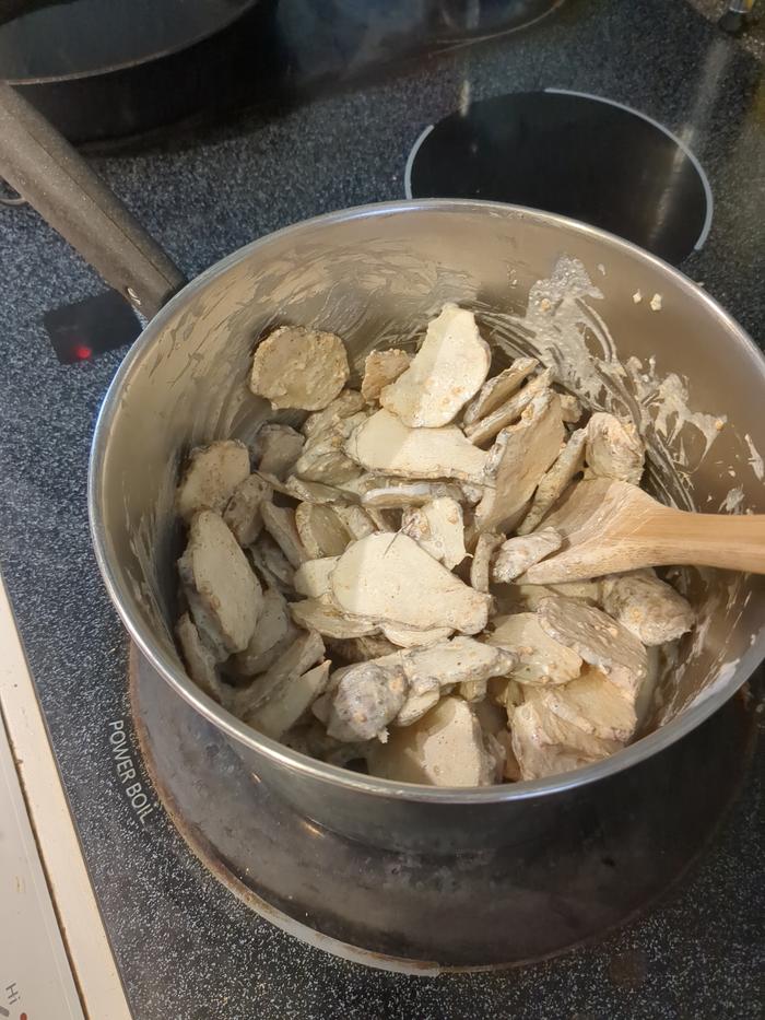 Sunchokes, cream, and seasonings in the pot. Not quite enough liquid.