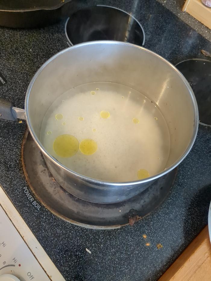 Cooking in the pot with some olive oil, salt, and vinegar. Yum.