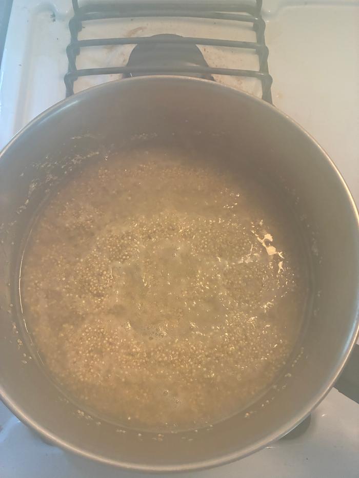 Simmering quinoa.