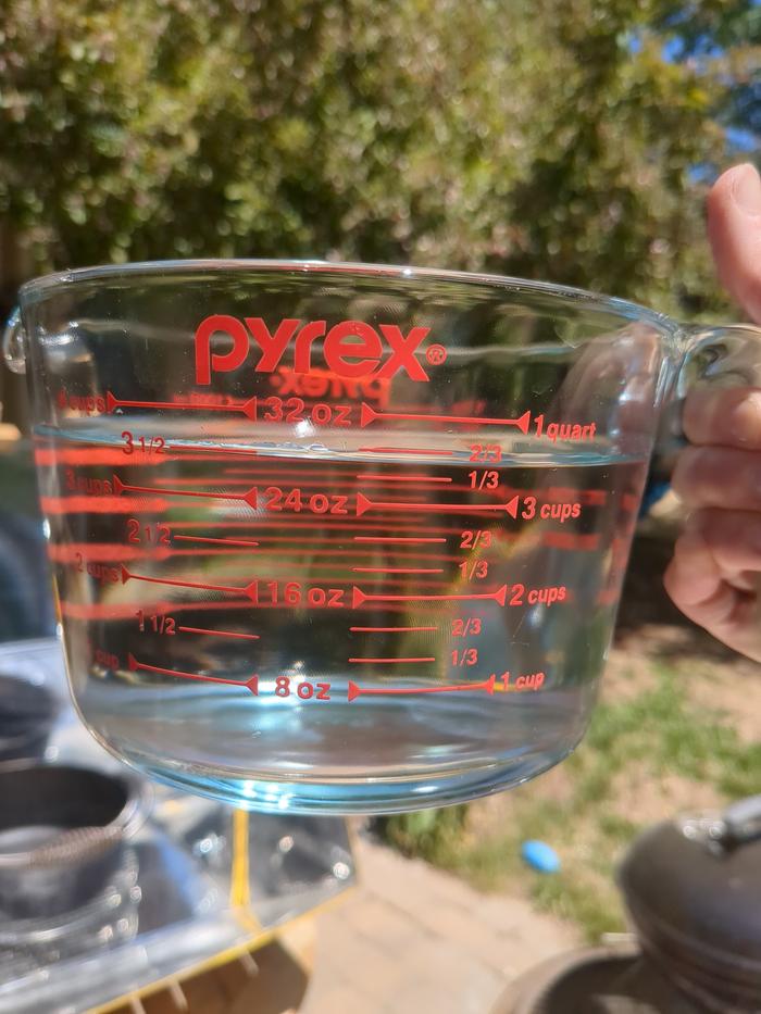 A little less than 4 cups water (since the rice has already absorbed some water). I did end up adding more later since it wasn't cooking as I expected.