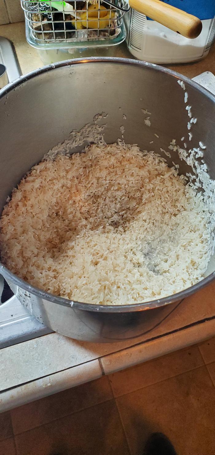 6 cups of uncooked rice, being washed