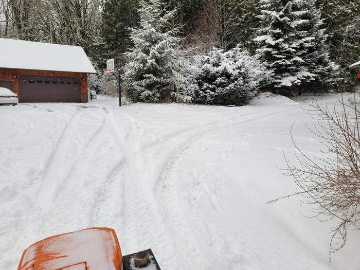 Snowy parking area.