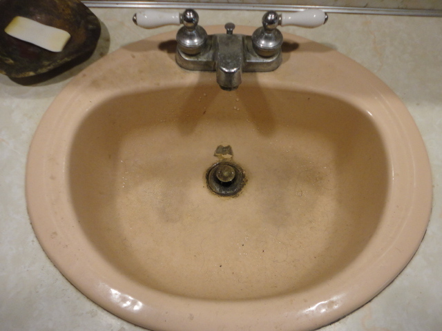 The before shot of the sink.