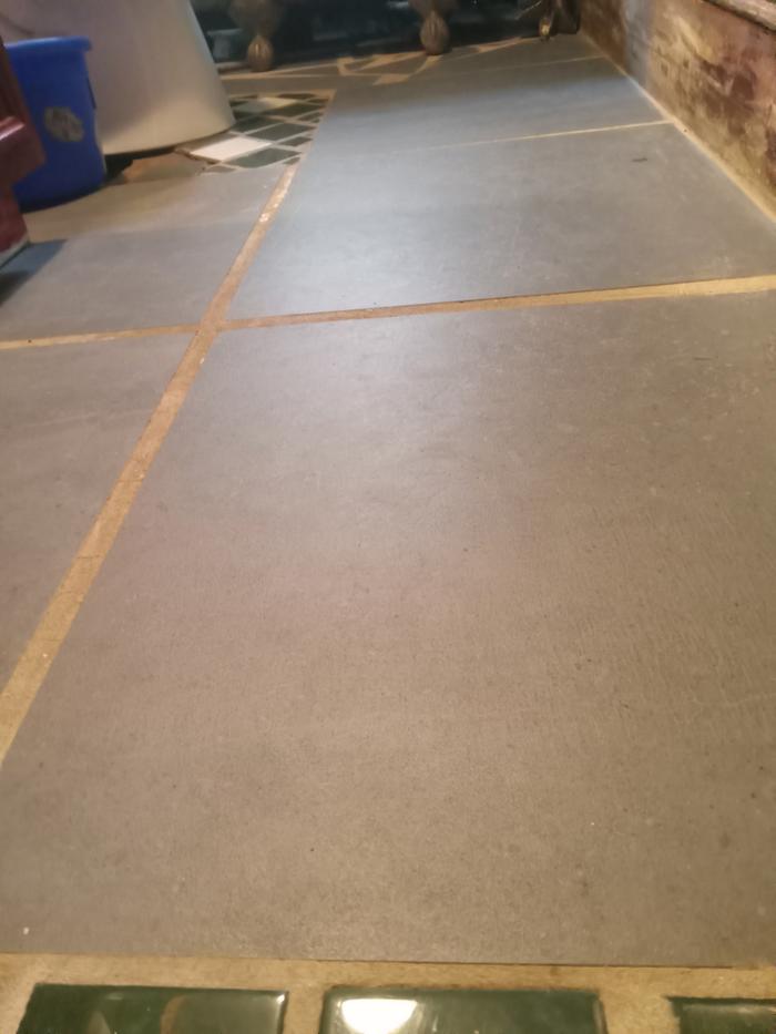 Nice shiny floor! The baseboards are also clean just need sanded and oiled.