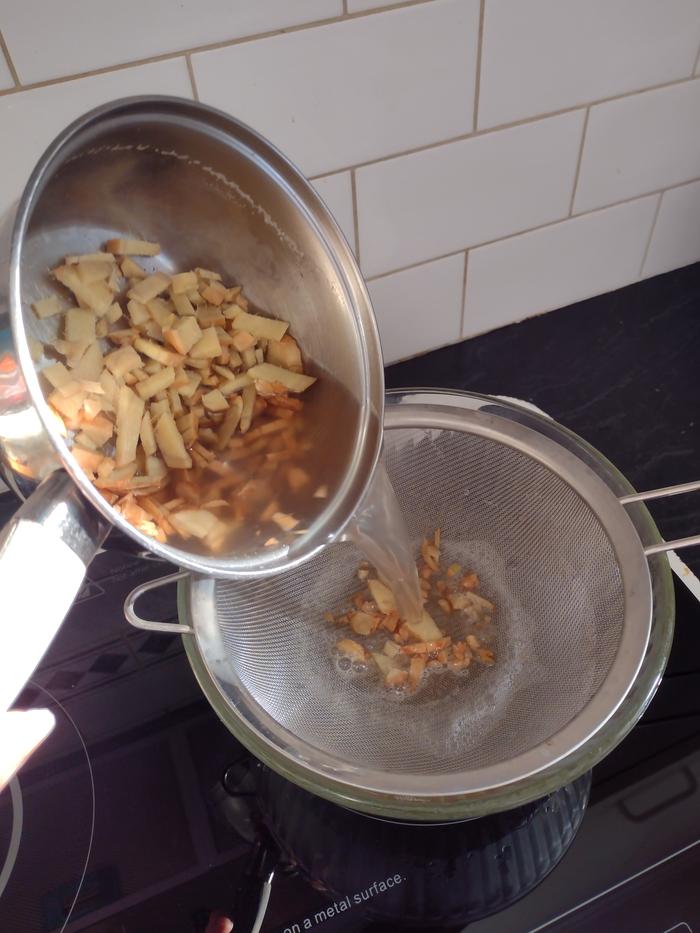 Straining into a glass bowl