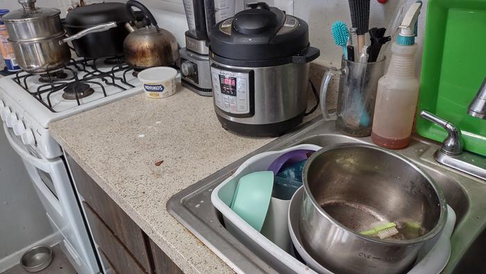 [Thumbnail for 01-dirty-counter-stove-sink.jpg]