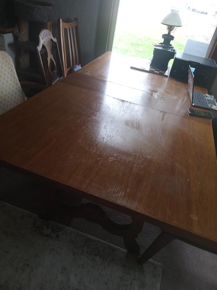 Table after. With a elf already taking up residence. The table was not clean ten minutes after and I found out they are not cleaning elf's they are the dreaded crafting elf! And they multiply!!!