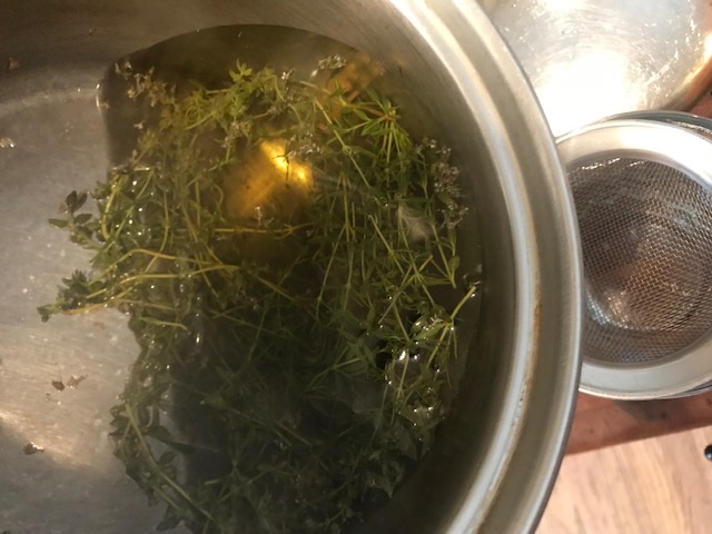 Straining off herbs
