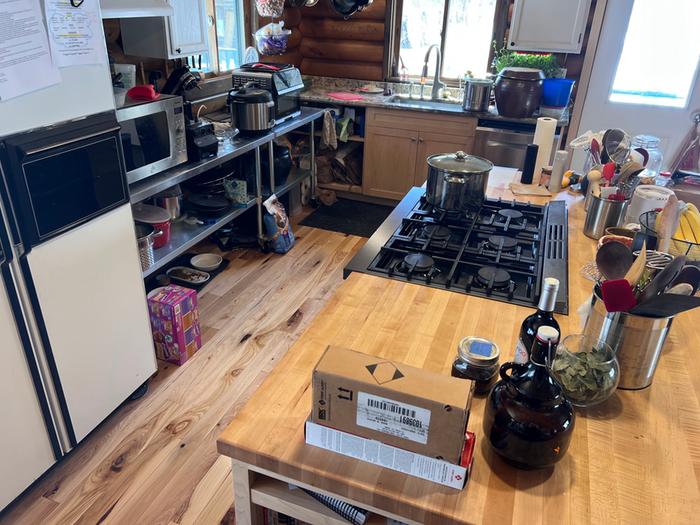 Here's a view of the kitchen. There was a decades-old extinguisher in the kitchen when we moved in but it got thrown out.