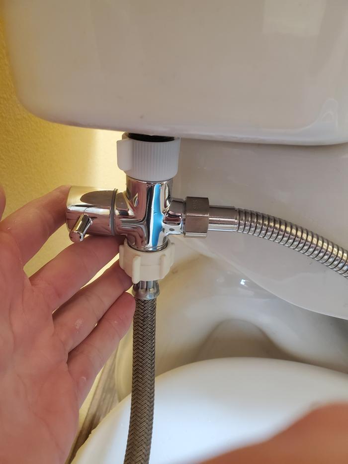 A toilet with bidet Y valve installed