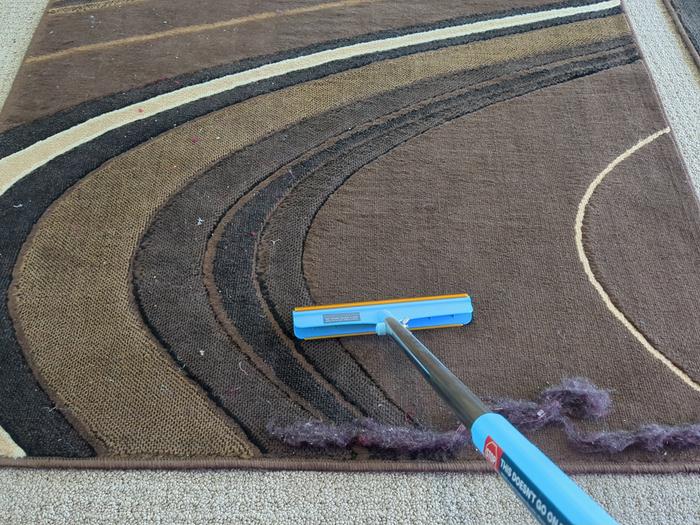 Scraping the rugs.