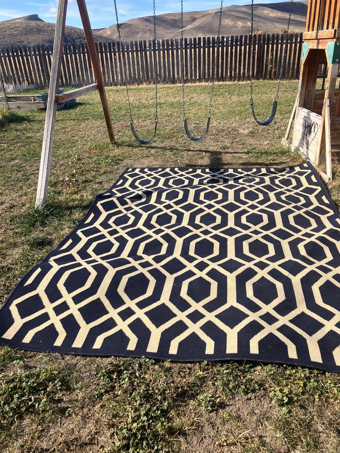 The wind knocked it down after an hour so I laid it flat in the grass instead for an additional 2 hours.