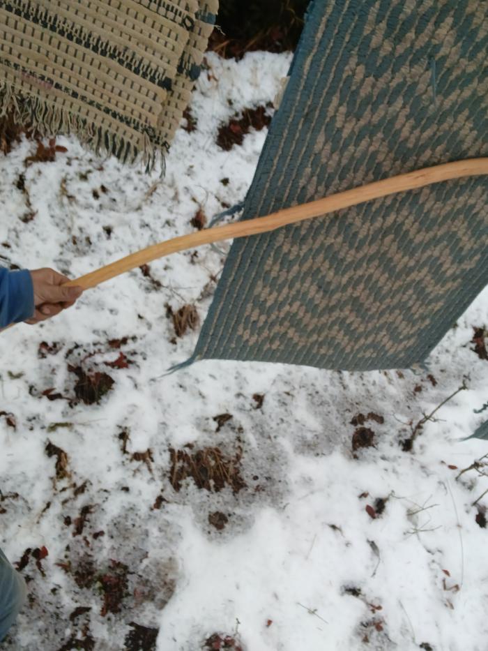 Beating the dust out of it, like it owed me money 💰 