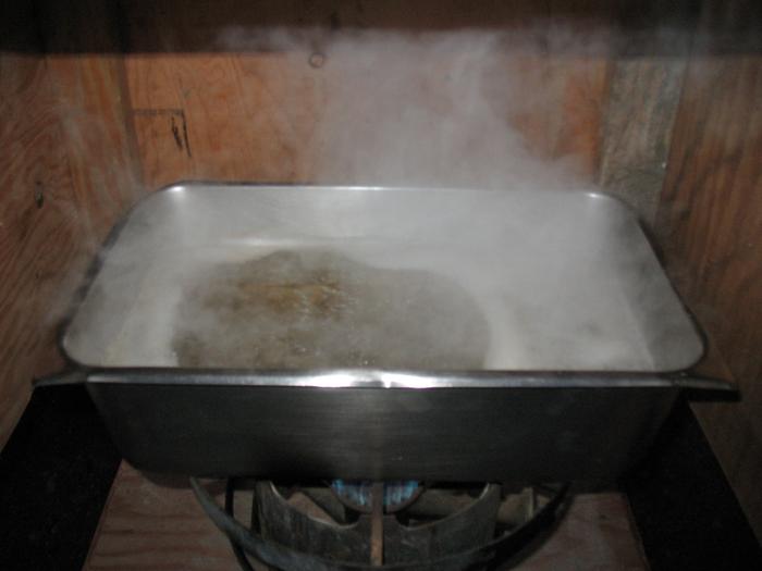 Sap boiling outdoors.