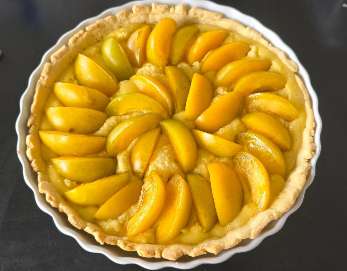 Putting together a plum tart
