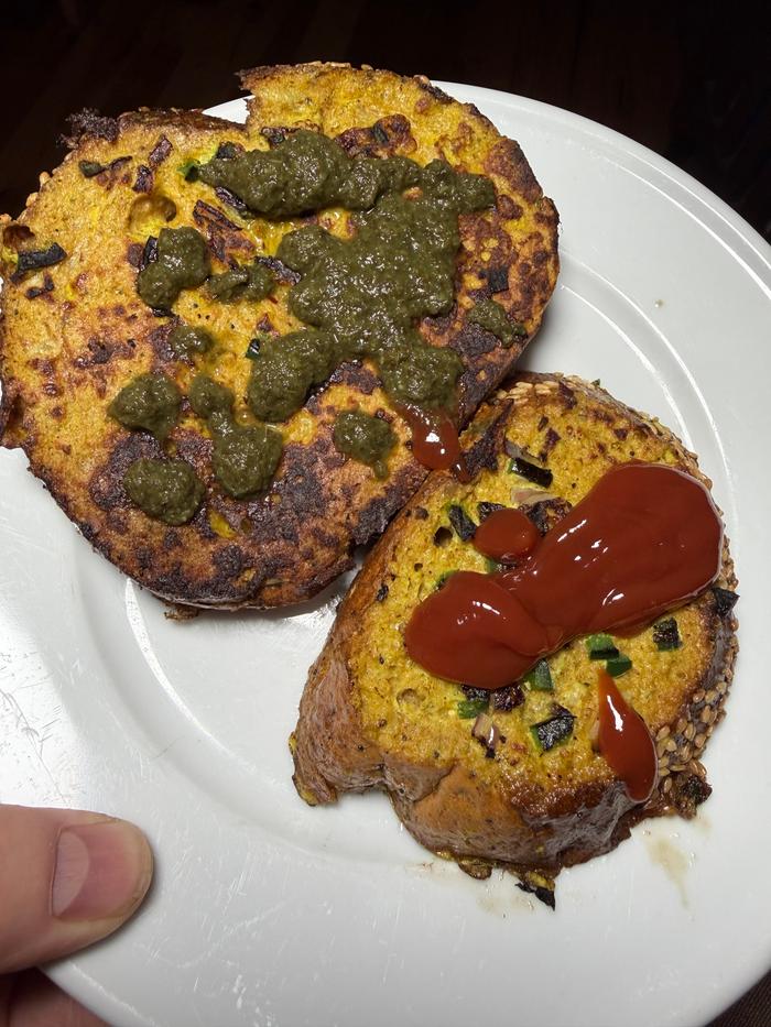 Masala toast topped with ketchup and cilantro chutney 