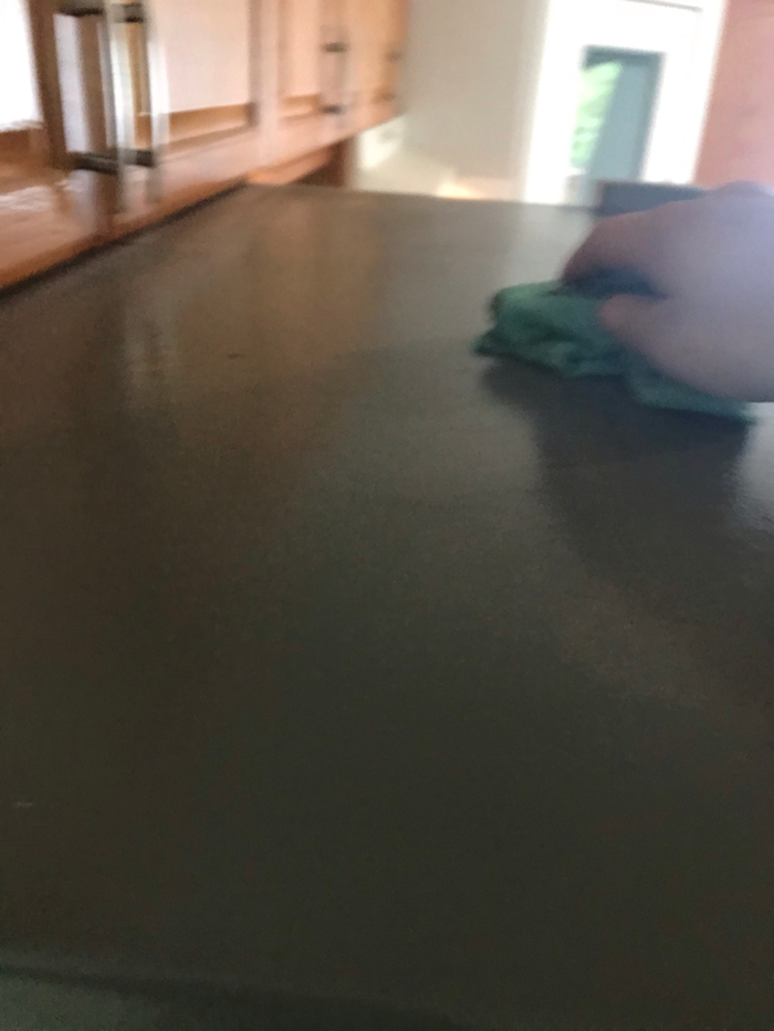 Cleaning the top of the fridge