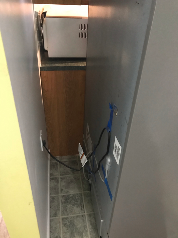 The clean back of the fridge