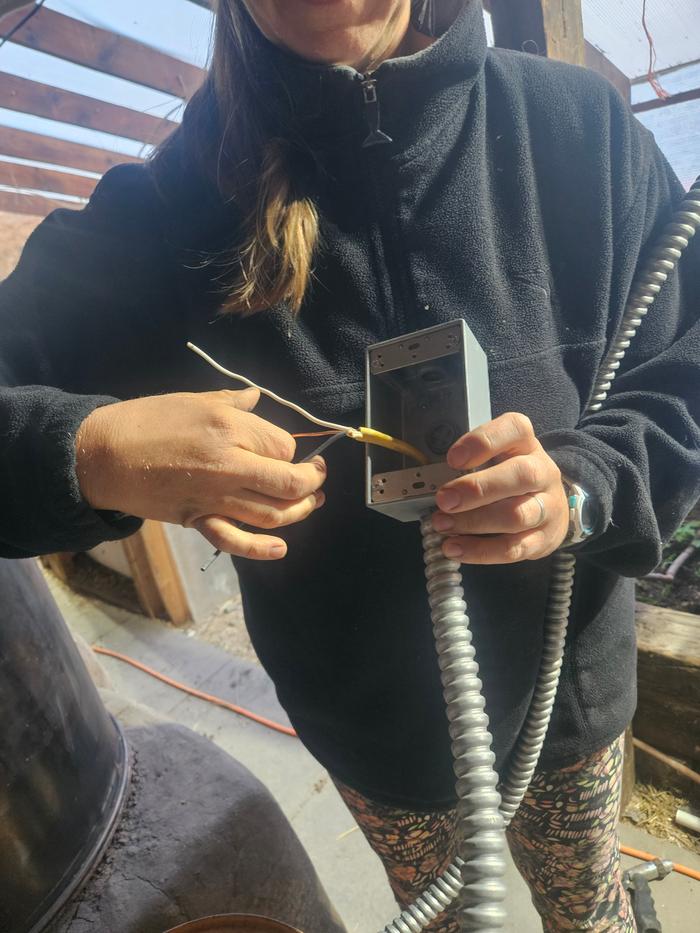 Pulling the wire through conduit to the box