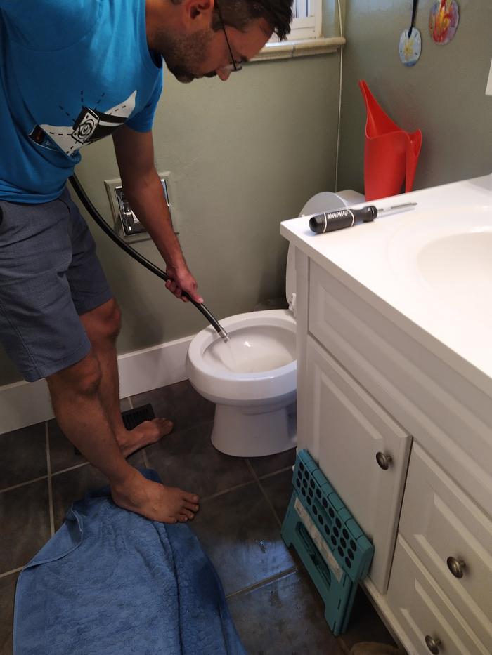 Some of first flush water went to the toilet, so I could see how much gunk there was. I'm now cleaning the toilet