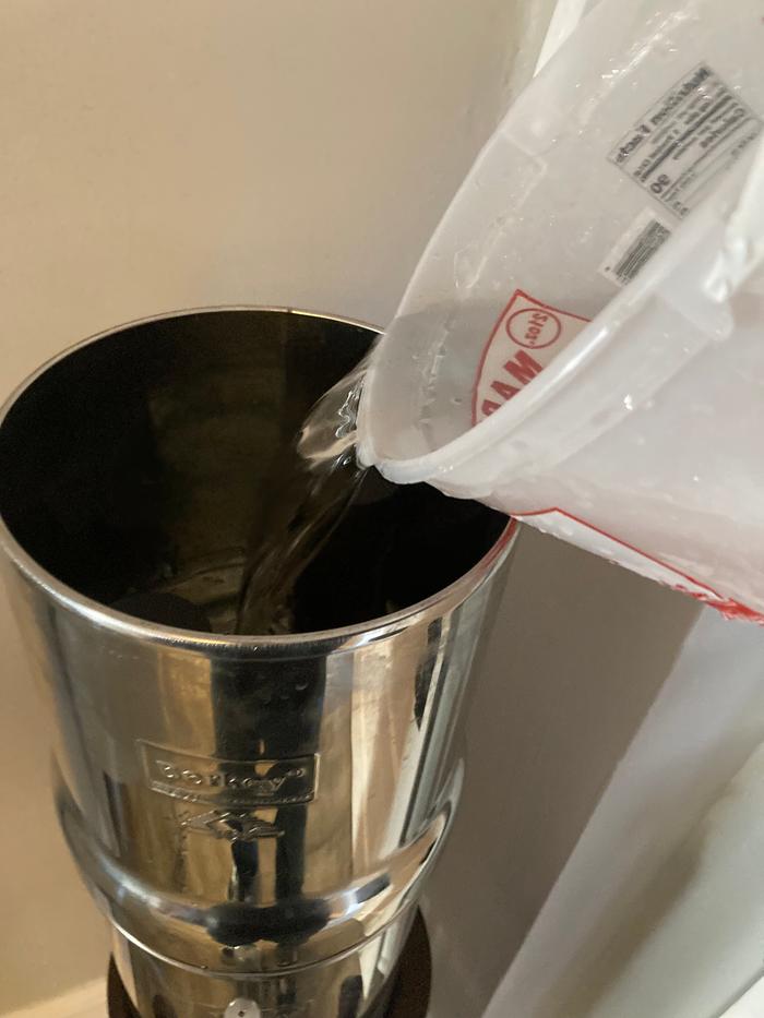 Adding collected water to the Berkey
