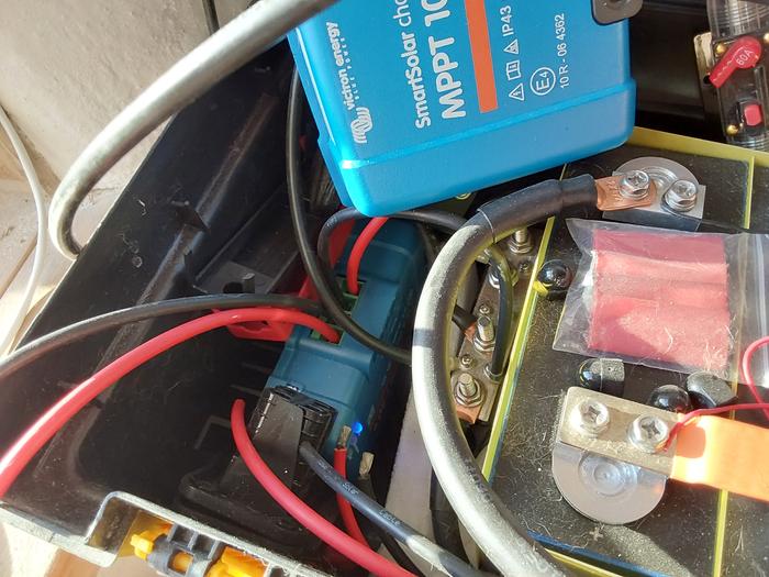 The 30-amp controller is deep in the belly of the beast, but working fine