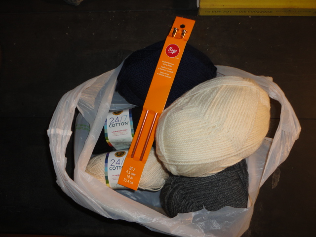 Here is a photo of my bag of cotton yarn and the knitting needles.