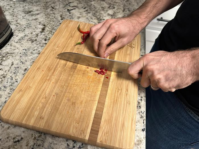 cutting up the cayenne while preparing the tincture