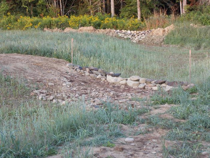  rock check dams, and sediment trap on swale