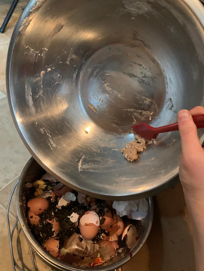 Scraping into compost 
