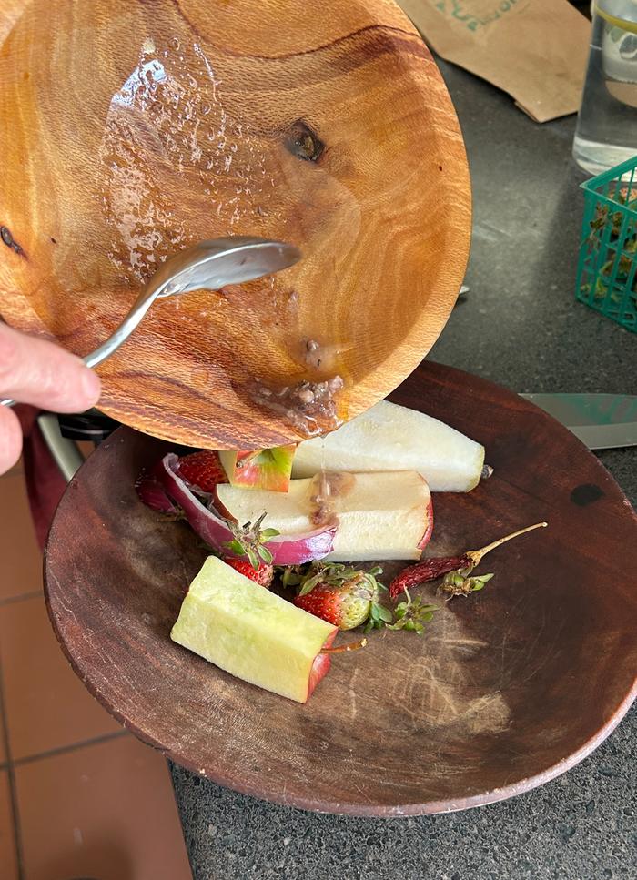 Scraping greasy bits into the hen’s scrap bowl