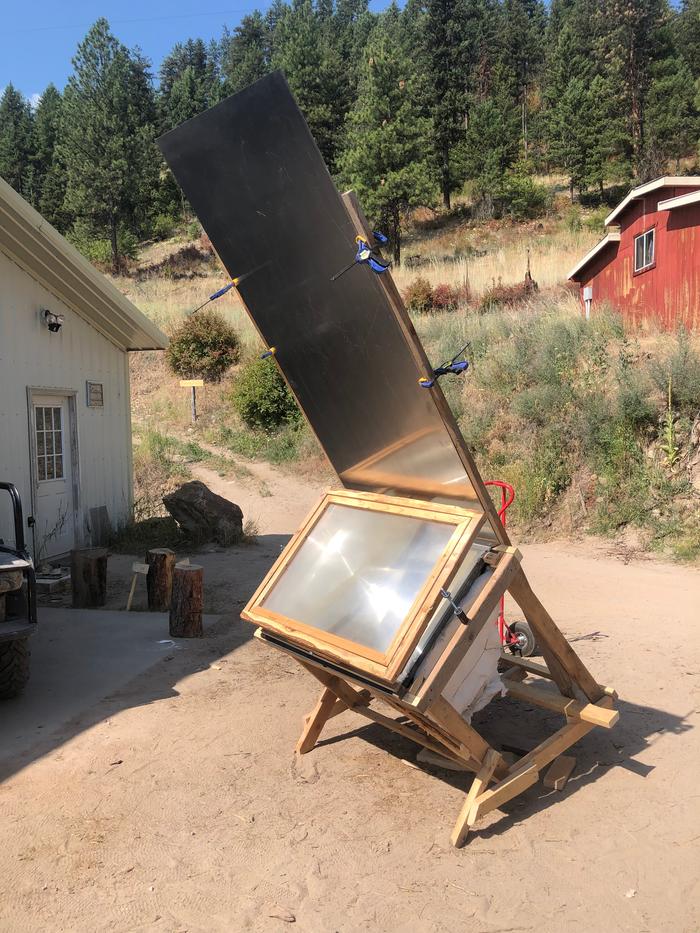 I found a large sheet of stainless steel in the shop and decided to build a reflector like solar ovens have