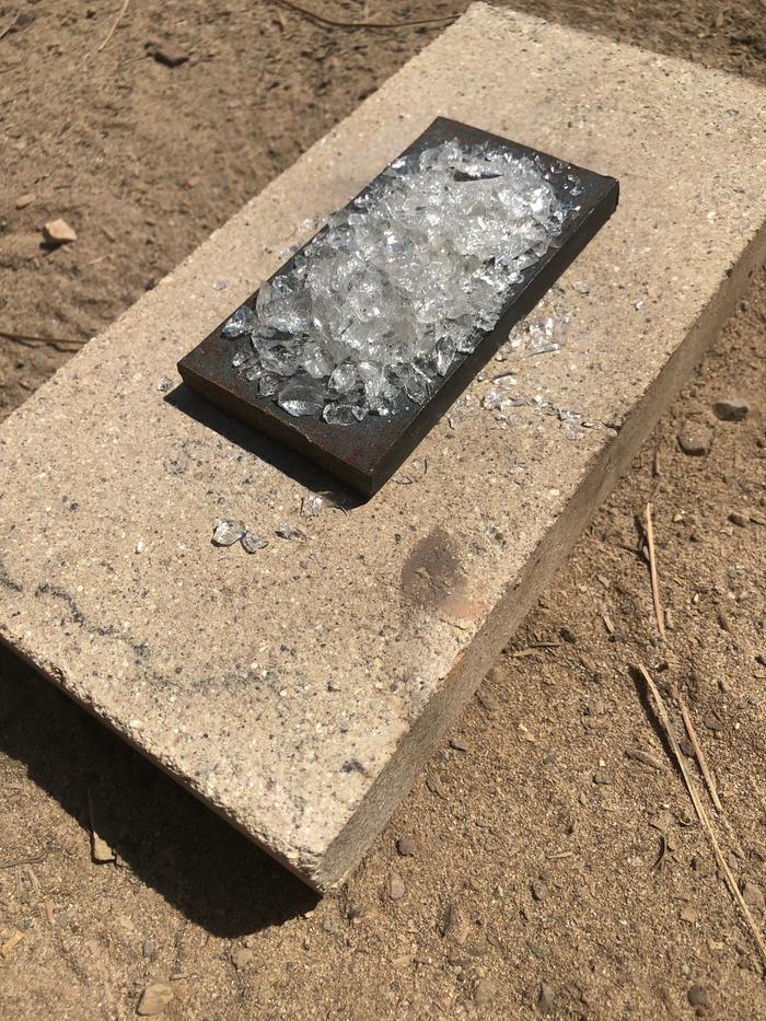 Clear glass on steel plate on firebrick