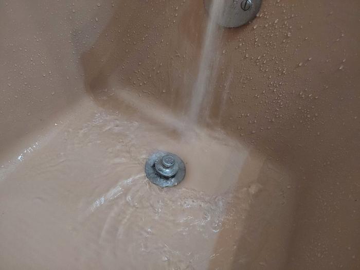 The drain actually runs clear now and keeps up with the faucet. My work here is done! 