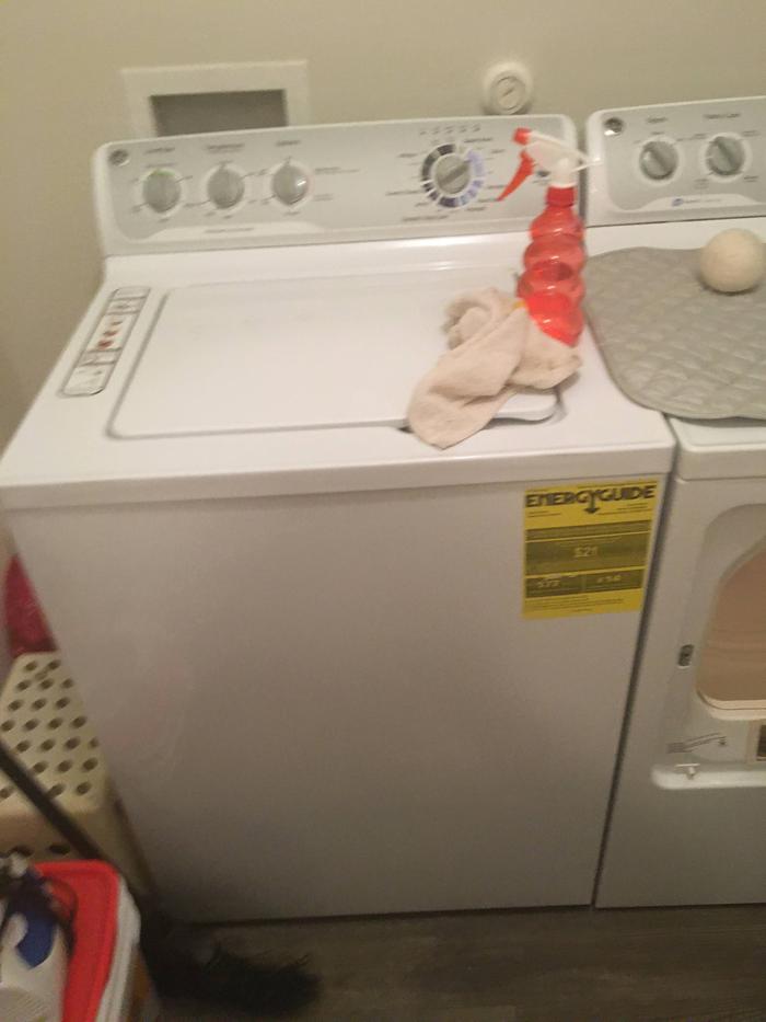 Washer cleaned (red bottle is vinegar solution)