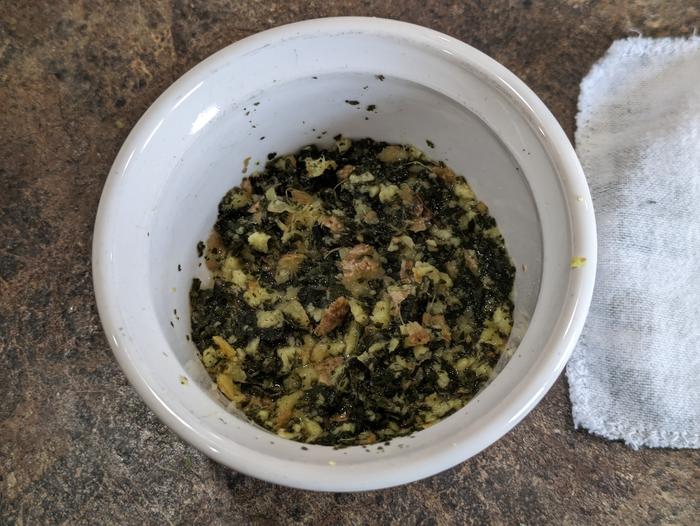 Grated ginger, dried comfrey, and hot water