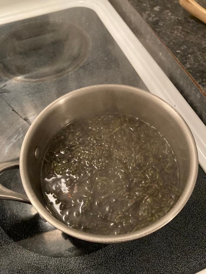 Dried lavender flowers steeping in water