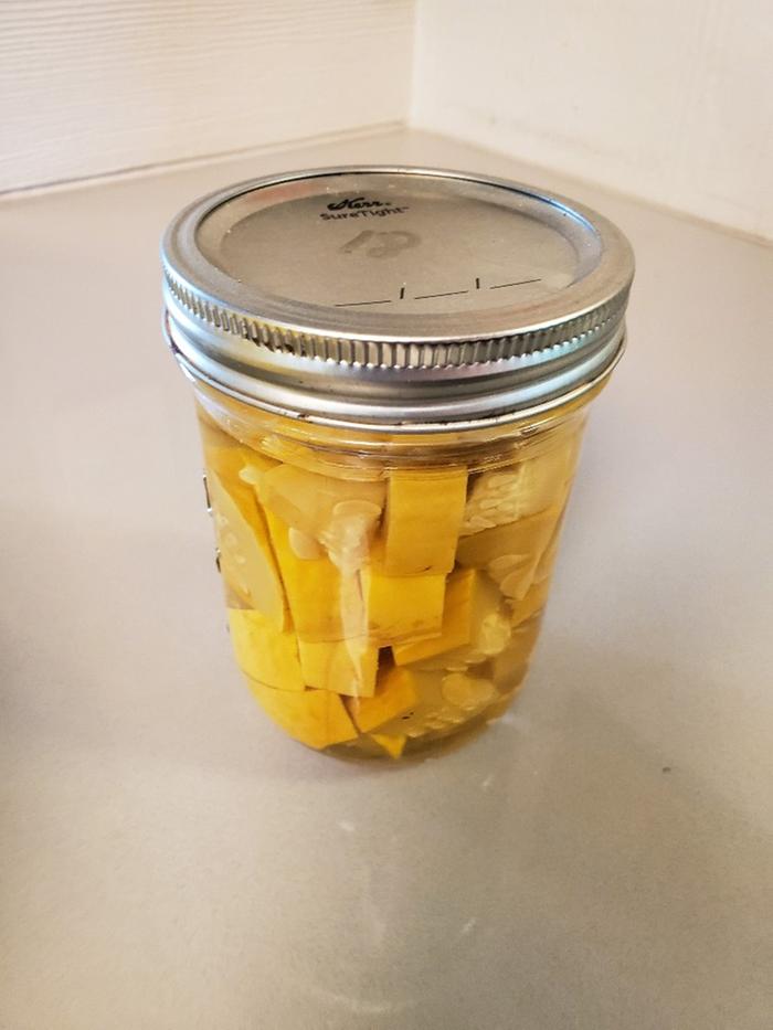 jar of canned yellow squash