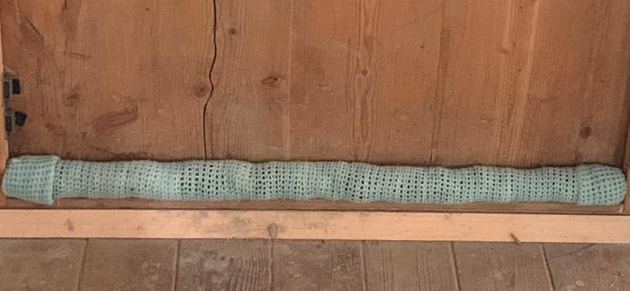 Draft excluder with the ends tucked over&mdash;I think I prefer it the other way