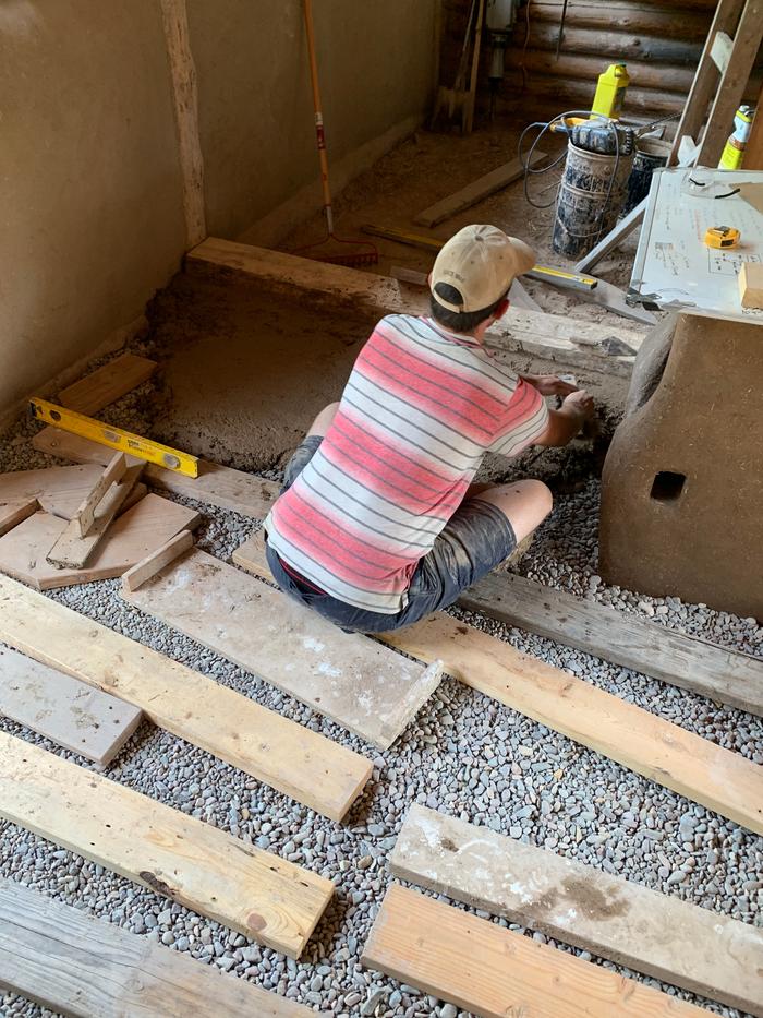 Dave working on the no-plastic cob floor