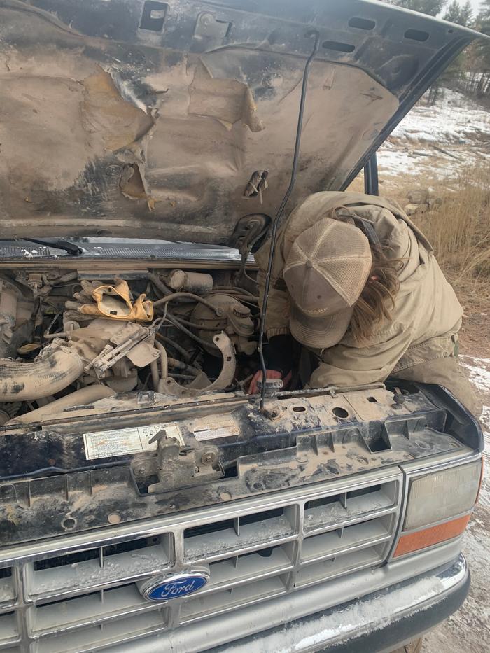 Austin replacing the power steering belt on Doug