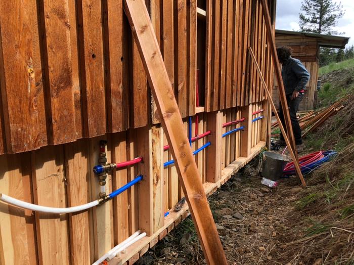 Some much needed plumbing work on the shower shack. We are running new pipes inside the wall to protect them from UV degradation