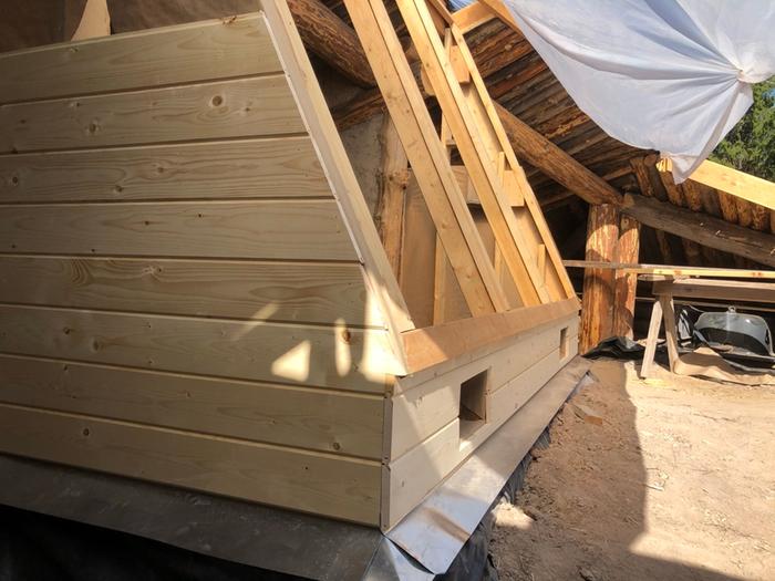 wooden siding on greenhouse