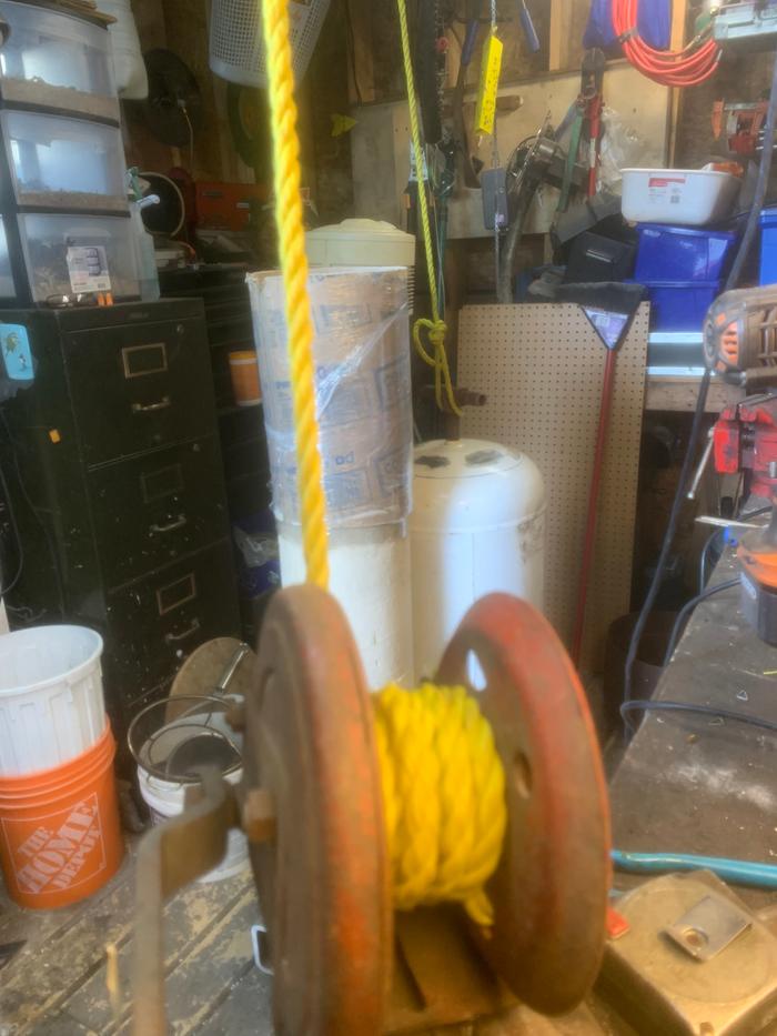 Winch secured to tee on bell