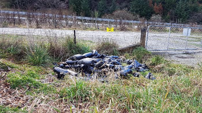 Bags of spent coffee grounds