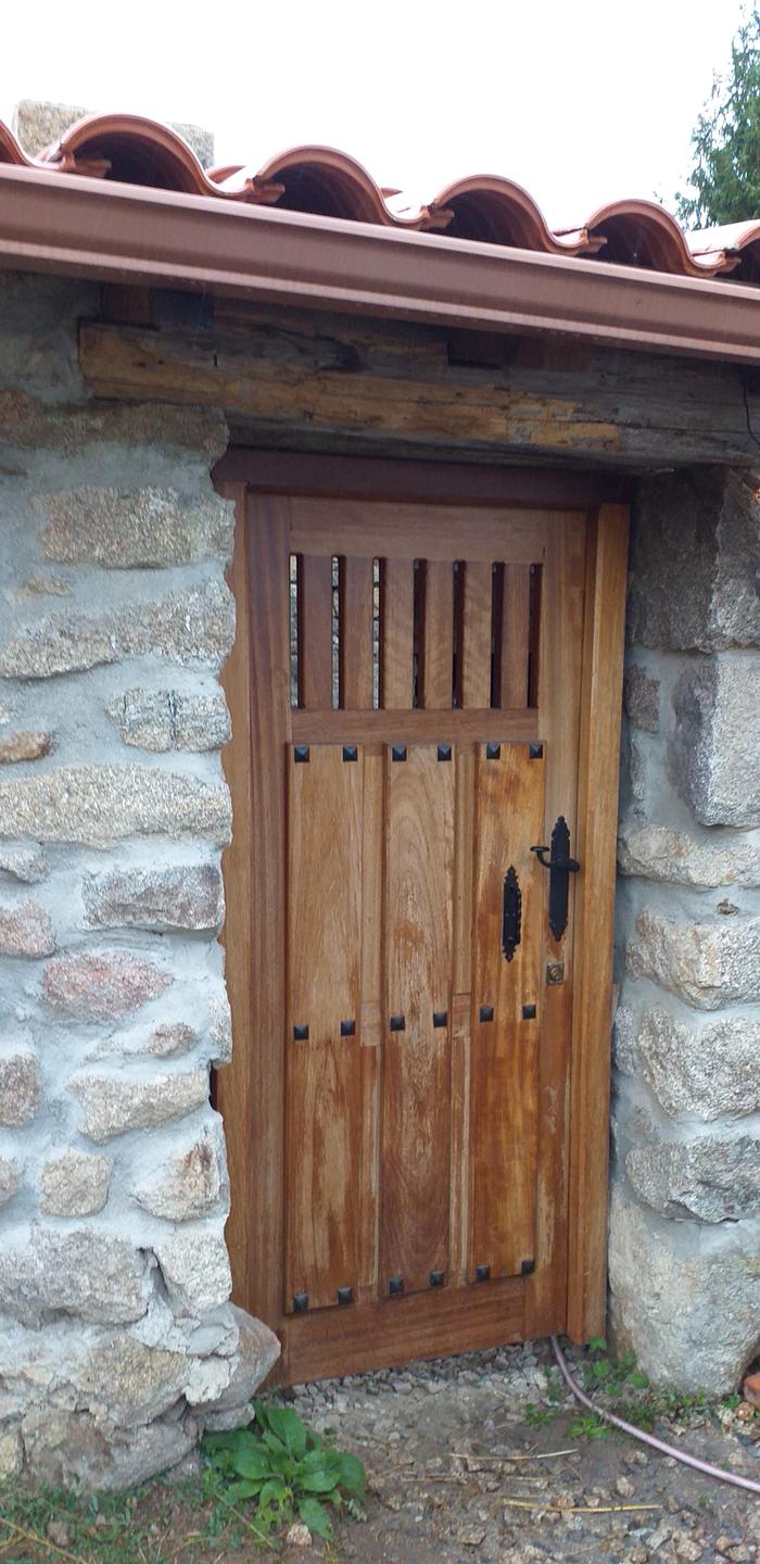 Bodega style door to courtyard - love the style, teak