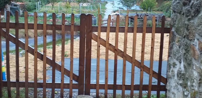 High gates to polytunnel field. Bit heavy on the hinges but love them. Pallets and scrap wood. Would use square posts next time.