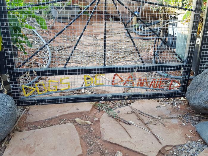 My small dog kept crawling under the gate, so I added the word play to keep the area dammed off.